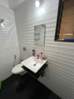 Bathroom in 1 BHK Apartment at Haware Dahlia, Kasarvadavali – for Rent