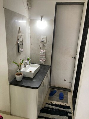Bathroom in 2 BHK Apartment at Runwal The Central Park, Chinchwad – for Rent