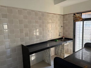 Kitchen in 2 BHK Apartment at Navkar Sakshat Navkar, Borivali West – for Sale