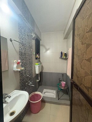 Bathroom in 1 BHK Apartment at Vihang Valley Phase1, Kasarvadavali – for Rent