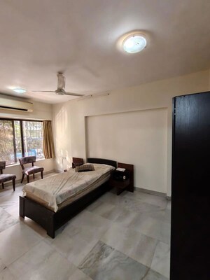 Living Room in 4 BHK Apartment at Prabhadevi CHS, Prabhadevi – for Rent