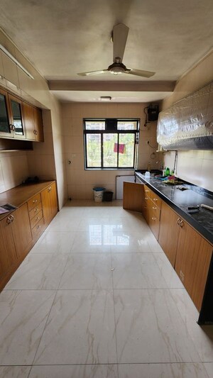 Kitchen in 3 BHK Apartment at Swaraj Accolade Chs, Louis Wadi – for Rent