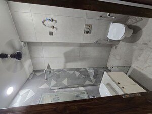 Bathroom in 3 BHK Builder Floor at Kohat Enclave – for Sale