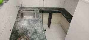 Kitchen in 1 BHK Apartment at Dhanlaxmi Apartments Narayan Peth, Narayan Peth – for Sale