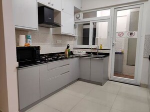 Kitchen in 3 BHK Apartment at Pashmina Waterfront, Old Madras Road – for Rent