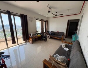 Living Room in 2 BHK Apartment at Raja Pittie Kourtyard, Kharadi – for Rent