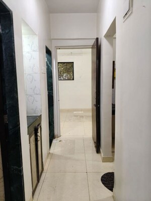 Building Lobby in 1 BHK Apartment at Shiv Parvati Society, Nerul – for Rent