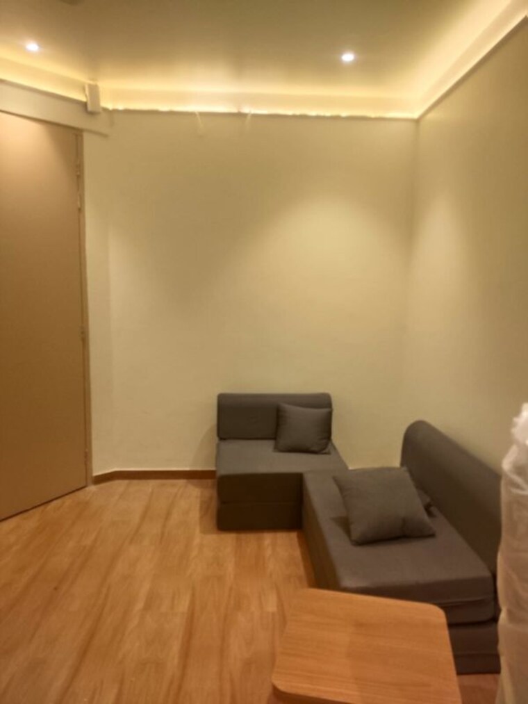 Living Room, dlf phase v 1 Bedroom 850 Sq.Ft. Apartment In Dlf Phase V Gurgaon 10410559