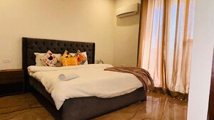 Bedroom in 1 BHK Builder Floor at Sushant Lok I – for Rent