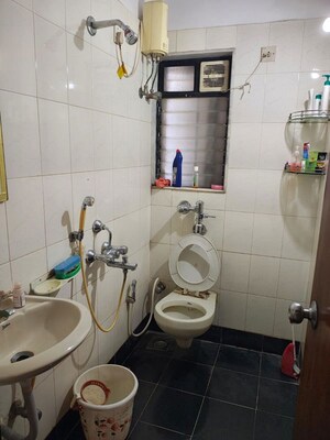 Bathroom in 3 BHK Apartment at RNA NG Suncity Phase II, Kandivali East – for Rent