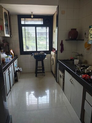 Kitchen in 3 BHK Apartment at RNA NG Suncity Phase II, Kandivali East – for Rent