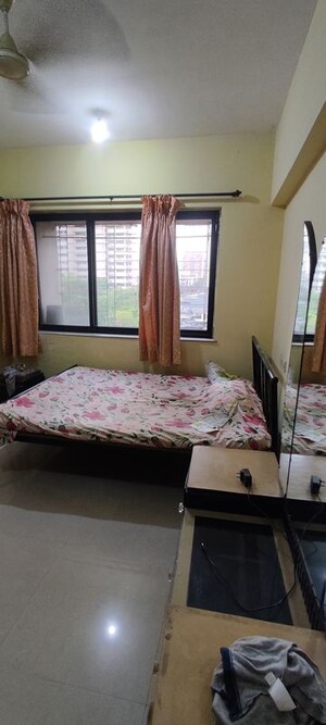 Bedroom in 1 BHK Apartment at K Raheja Palm Court J Building, Malad West – for Rent
