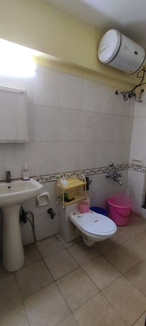 Bathroom in 1 BHK Apartment at K Raheja Palm Court J Building, Malad West – for Rent