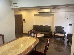 Living Room in 2 BHK Apartment at Lokhandwala Complex – for Rent