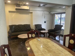 Living Room in 2 BHK Apartment at Lokhandwala Complex – for Rent