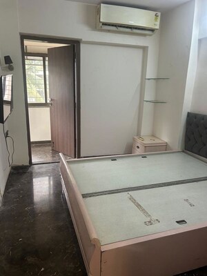 Bedroom in 2 BHK Apartment at Lokhandwala Complex – for Rent
