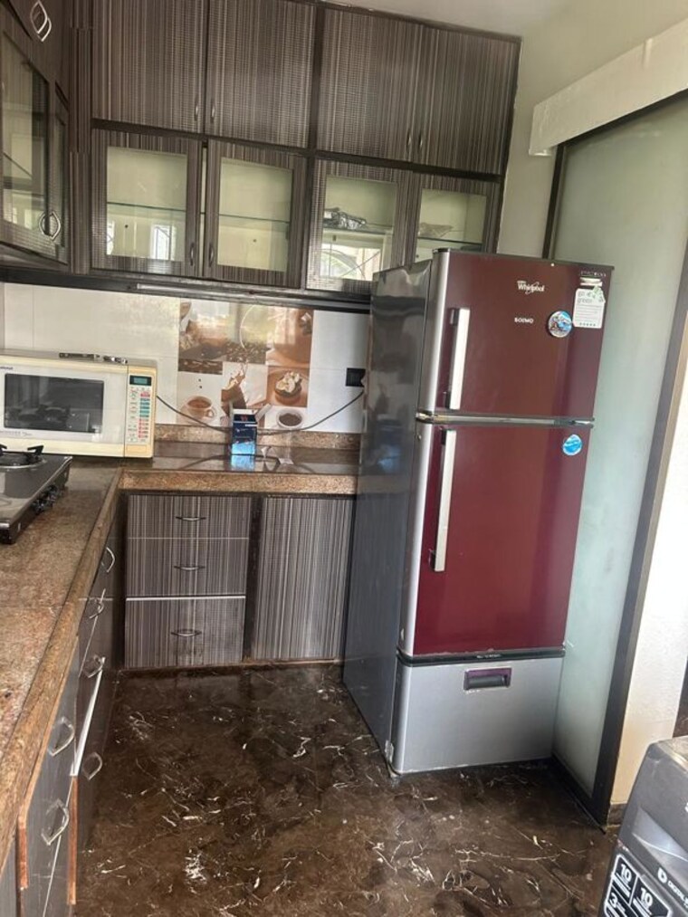 Kitchen, lokhandwala complex 2 Bedroom 1000 Sq.Ft. Apartment In Lokhandwala Complex Mumbai 10410817