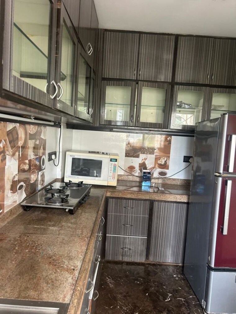 Kitchen, lokhandwala complex 2 Bedroom 1000 Sq.Ft. Apartment In Lokhandwala Complex Mumbai 10410817