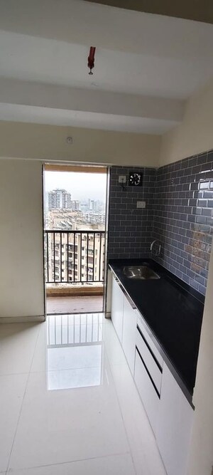 Kitchen in 1 BHK Apartment at Amrut Park CHS, Kalyan West – for Rent