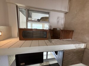 Kitchen in 2.5 BHK Apartment at Prateek Fedora, Sector 61 – for Sale