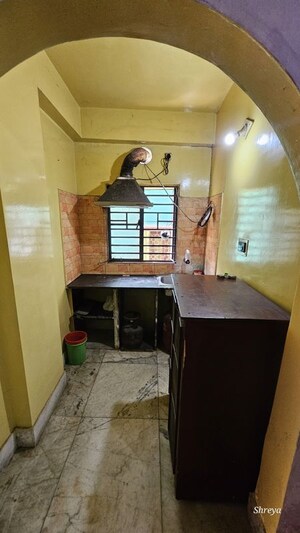 Kitchen in 2 BHK Apartment at Airport Tower, Dum Dum – for Rent
