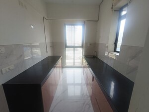 Kitchen in 2 BHK Apartment at Raymond Ten X Habitat, Pokhran Road No Two – for Rent
