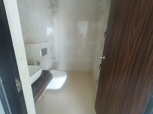 Bathroom in 2 BHK Apartment at Raymond Ten X Habitat, Pokhran Road No Two – for Rent