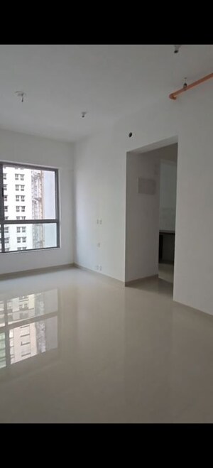 Room in 1 BHK Apartment at Kalpataru Immensa F, Kolshet Road – for Sale