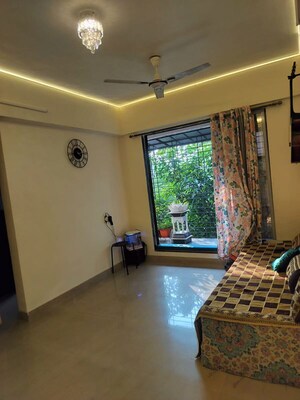 Living Room in 1 BHK Apartment at Dream Crystal, Kharghar – for Rent