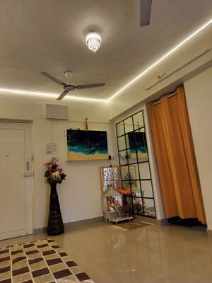 Living Room in 1 BHK Apartment at Dream Crystal, Kharghar – for Rent