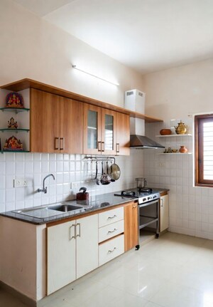 Kitchen in 4 BHK Apartment at Raja Park – for Sale