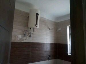 Bathroom in 2 BHK Builder Floor at Chattarpur – for Rent