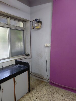 Kitchen in 1 BHK Apartment at Hanuman Ramanand CHS, Vile Parle East – for Rent