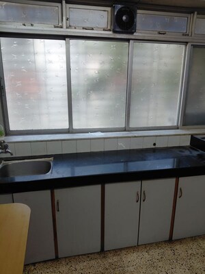 Kitchen in 1 BHK Apartment at Hanuman Ramanand CHS, Vile Parle East – for Rent