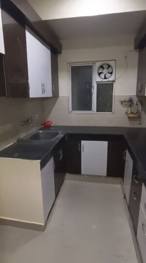 Kitchen in 2 BHK Apartment at VVIP Addresses, Raj Nagar Extension – for Rent