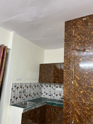 Kitchen in 1 RK Apartment at Raj Nagar Extension – for Rent