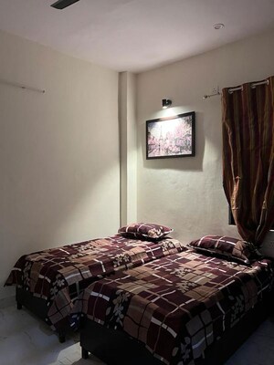 Bedroom in 1 RK Apartment at Raj Nagar Extension – for Rent