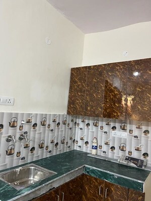 Kitchen in 1 RK Apartment at Raj Nagar Extension – for Rent