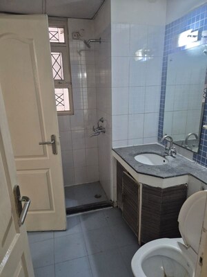 Bathroom in 4 BHK Apartment at Puri Diplomatic Greens Phase I, Sector 111 – for Rent