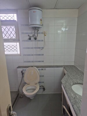 Bathroom in 4 BHK Apartment at Puri Diplomatic Greens Phase I, Sector 111 – for Rent