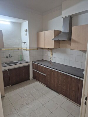 Kitchen in 4 BHK Apartment at Puri Diplomatic Greens Phase I, Sector 111 – for Rent