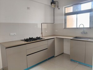 Kitchen in 2 BHK Apartment at Hiranandani Delanna, Ghodbunder Road – for Rent