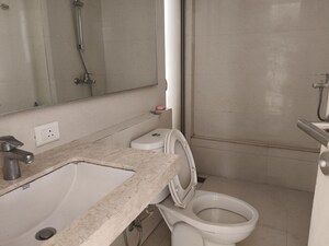 Bathroom in 2 BHK Apartment at Hiranandani Delanna, Ghodbunder Road – for Rent
