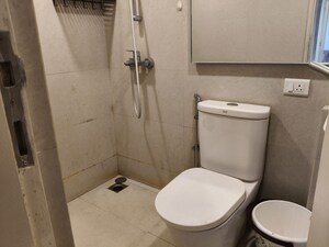 Bathroom in 2 BHK Apartment at Hiranandani Delanna, Ghodbunder Road – for Rent