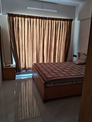 Bedroom in 2 BHK Apartment at Kabra Garnet, Malad West – for Rent