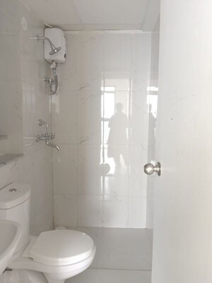 Bathroom in 2 BHK Apartment at Runwal Gardens, Dombivli East – for Rent