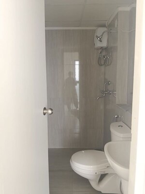 Bathroom in 2 BHK Apartment at Runwal Gardens, Dombivli East – for Rent