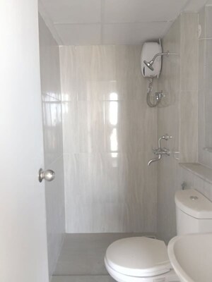 Bathroom in 1.5 BHK Apartment at Runwal Gardens, Dombivli East – for Rent