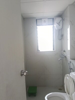 Bathroom in 1 BHK Apartment at Runwal Gardens, Dombivli East – for Rent