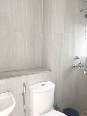 Bathroom in 1 BHK Apartment at Runwal Gardens, Dombivli East – for Rent